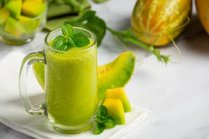 glass melon juice put white marb